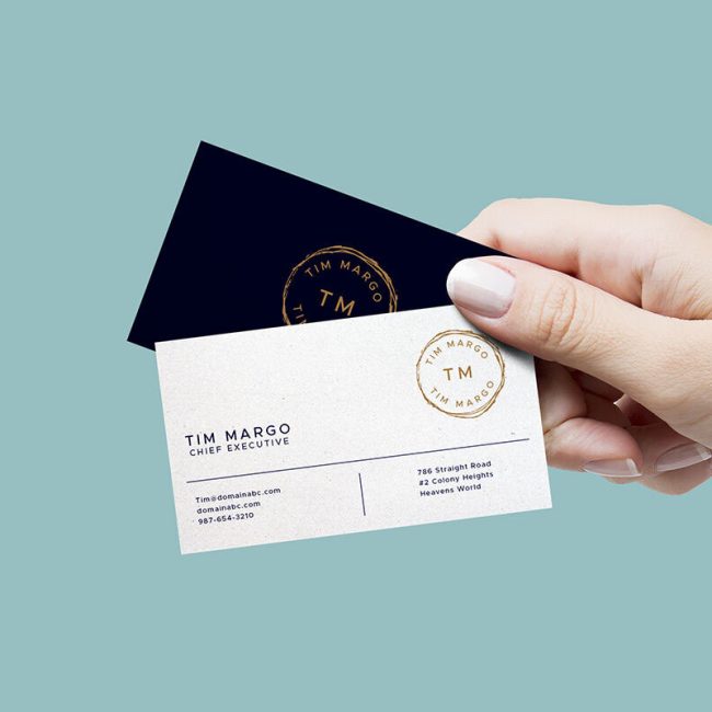 mockup-of-a-hand-holding-two-business-cards-1
